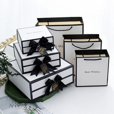 Contenitori di regalo magnetici bianchi rigidi del cartone con Rim And Ribbon Bow nero