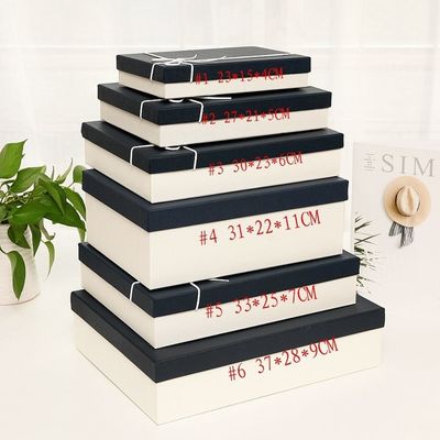 Coperchio multifunzionale di carta di struttura speciale e contenitore di regalo basso con il nastro della corda