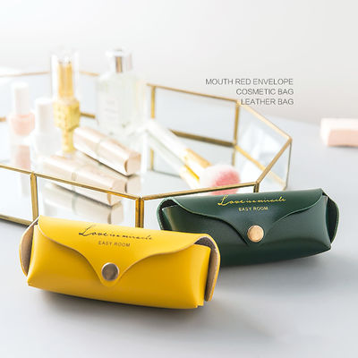 L'unità di elaborazione impermeabile della cassa del rossetto di viaggio riveste di pelle il giallo portatile